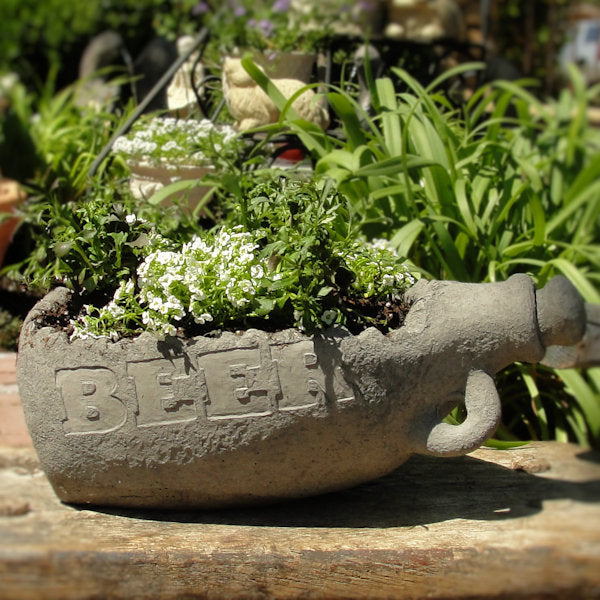 beer planter growler concrete