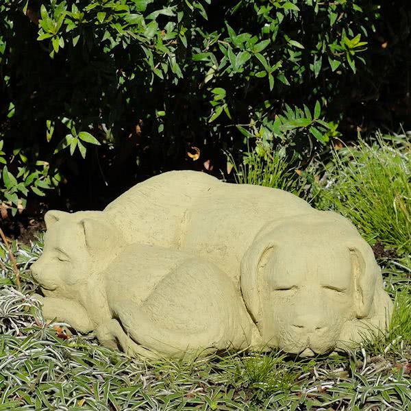 sleeping cat and dog statue