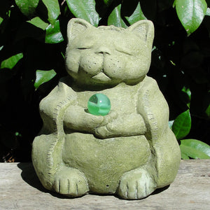 meditating cat sculpture with marble