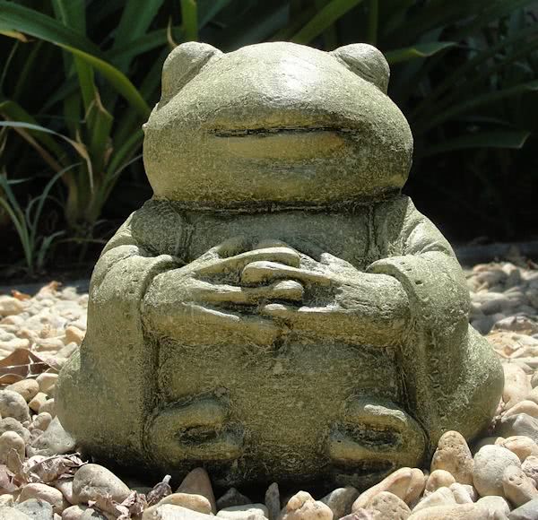 meditating buddha frog stone sculpture